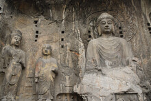 Buddha Statue Carving At Longmen Grottoes In Luoyang, Henan Province, China