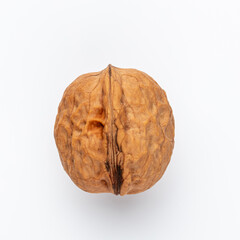 Wall Mural - One single Walnut on white background.