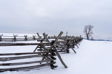 Canvas Print - A long wooden fence in a Fort Pillow State Historic Park during winter