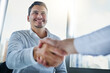 © Arnéll K/peopleimages.com - So glad to finally meet. Shot of two businessmen shaking hands in an office.