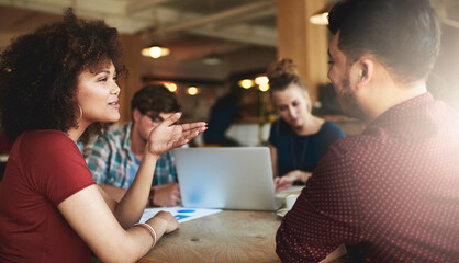 Poster - It helps to have a study partner. Shot of students studying in a coffee shop.