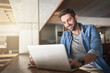 © Jadon Bester/peopleimages.com - For productivity, just log in. Shot of a handsome young man using a laptop in a coffee shop.