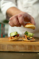 Wall Mural - chef preparing sandwich