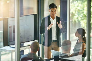 Aufkleber - Stay with me.... Shot of a group of businesspeople meeting in the boardroom.