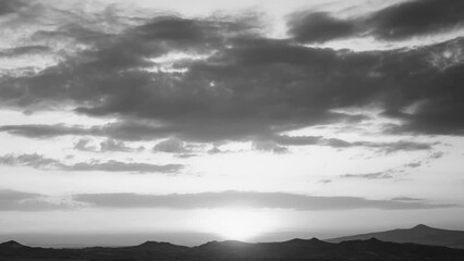 Wall Mural - 4k video time-lapse of amazing black and white landscape of scenic cappadocia. sunset over mountains