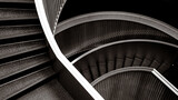 Fototapeta  - looking down on parts of a spiral staircase