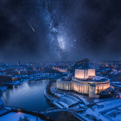 Wall Mural - Milky way and Opera Nova at winter in Bydgoszcz, Poland
