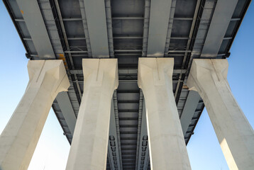 Four road bridge supports close-up. Engineering and architecture. Outdoors