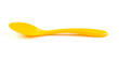 © Aigul - Bright yellow plastic spoon for feeding the baby on a white isolated background. Side view.