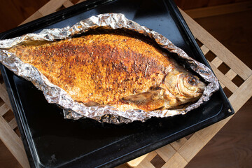 Baked fish in foil. Select photo