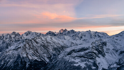 Wall Mural - Snowy Greater Caucasus ridge. Mount. Ushba. Sunset. Panoramic view. Elbrus region, Kabardino-Balkaria, Russia