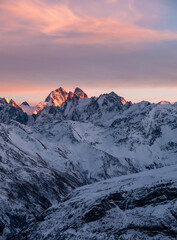 Wall Mural - Snowy Greater Caucasus ridge. Mount. Ushba. Sunset. Panoramic view. Elbrus region, Kabardino-Balkaria, Russia