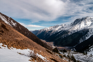 Wall Mural - Snowy Greater Caucasus ridge. Sunny day. Before suset. View from 3500m