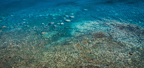Wall Mural - sea surface with small waves, top view in blue and turquoise color tones