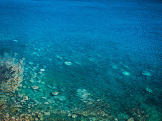 Wall Mural - sea surface with small waves, top view in blue and turquoise color tones