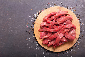 Poster - fresh chopped meat on wooden board
