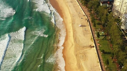 Sticker - Sports and active beachgoers people on Manly beach in Sydney – aerial 4k.
