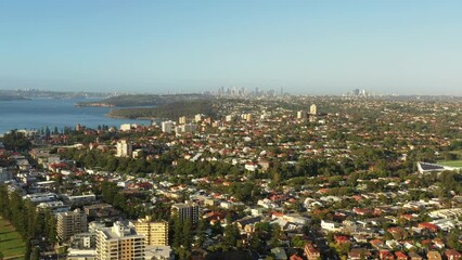 Canvas Print - Down aerial descend to Freshwater residential suburb over Manly as 4k.
