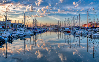 Wall Mural - Ships and boats on a beautiful sunset taken in Port Leucate South of France a Mediterranean ladnscape 