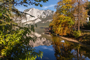 Fototapete - Panoramic view of beautiful mountain landscape with lake. Altausser see lake.