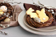 Easter table setting with cookies in shape of bunny, closeup