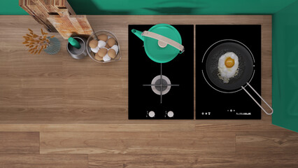 Wall Mural - Turquoise and wooden kitchen close up, induction and gas hob with pot and fried egg in a pan. Vase with spikes, cutting boards. Top view, plan, above with copy space, interior design