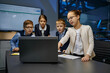 © Nomad_Soul - Diverse children business team analyzing financial data