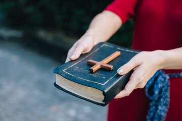 Sticker - Woman hands praying to god with wooden cross