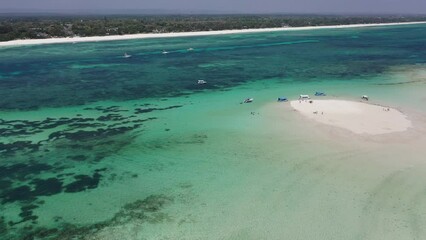 Wall Mural - sandbank with white sand and boats around small island Drone view Coastline Diani beach landscape Kenyan African Sea  aerial 4k indan ocean tropical mombasa turquoise white sand East Africa paradise