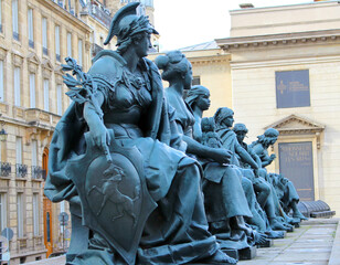 Wall Mural - Paris. France. 16 October 2020. Bronze green sculpture women near the parisian museum D Orsay.