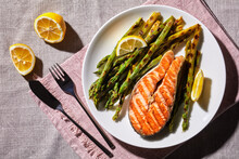 Grilled Salmon Steak With Asparagus And Lemon
