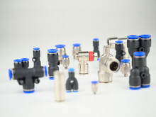 Various Brass And Plastic Pneumatic Components As Macro Wit Blur