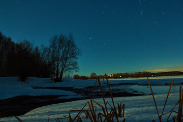 Wall Mural - Night winter landscape, frozen river