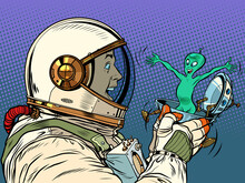 A Surprised Male Astronaut Looks At An Alien In A Festive UFO Flying Saucer Box