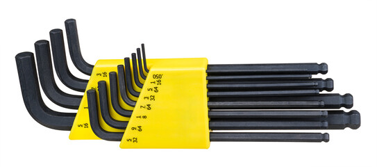 Black Allen key set of blued steel in yellow tool box isolated on a white background. Close-up of metal various sized hex L wrenches kit with oxide coating, ball ends and inch scale in plastic holder.