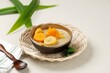 Kolak pisang is Indonesian traditional dessert made of banan and sweet potato with palm sugar sauce. Selective focus