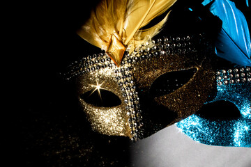 A detailed view of a two costume masks