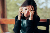 Fototapeta  - Sad Worried Woman Finding Tragic News over the Phone