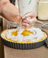 Poster - Chef adds cream to Passionflower Pie. French gourmet cuisine