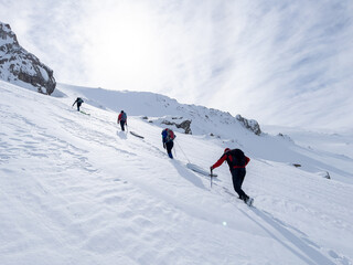 Wall Mural - Mountaineers hiking in the avalanche area