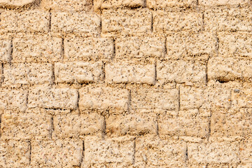 Wall Mural - Wall texture of old adobe bricks