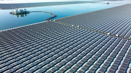 Aerial view floating solar cell power plant with solar cell generate the electric on the lake, Floating solar panels and cell platform on the water ecological energy, Alternative renewable energy.