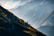 Ridge In Caucasus Mountains On Foggy Autumn Day