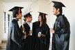 © Serhii - education, graduation and people concept - group of happy indian students