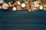 Fototapeta Uliczki - Concept of cooking garlic sauce on wooden background