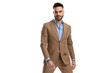 © Viorel Sima - sexy young businessman in brown suit being confident and posing