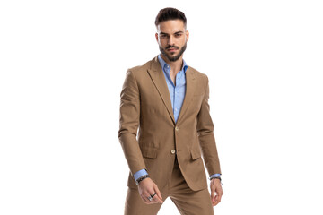 Sticker - sexy young businessman in brown suit being confident and posing