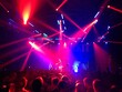 © grooveisintheheart - Crowd of fans in front of a stage at a gig. Fans and their favorite band at live performance.  Red lights above the stage. Gig, concert. Strobe lights. Scene. Perform. Musical band