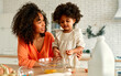 © Valerii Apetroaiei - African american family at home