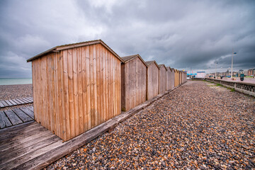 Beautiful wooden cabins on the shore of Dieppe, Normandy.